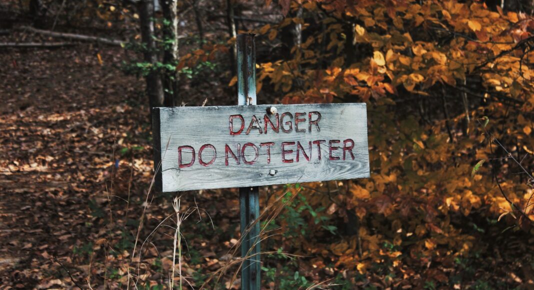 photo of gray danger do not enter signage
